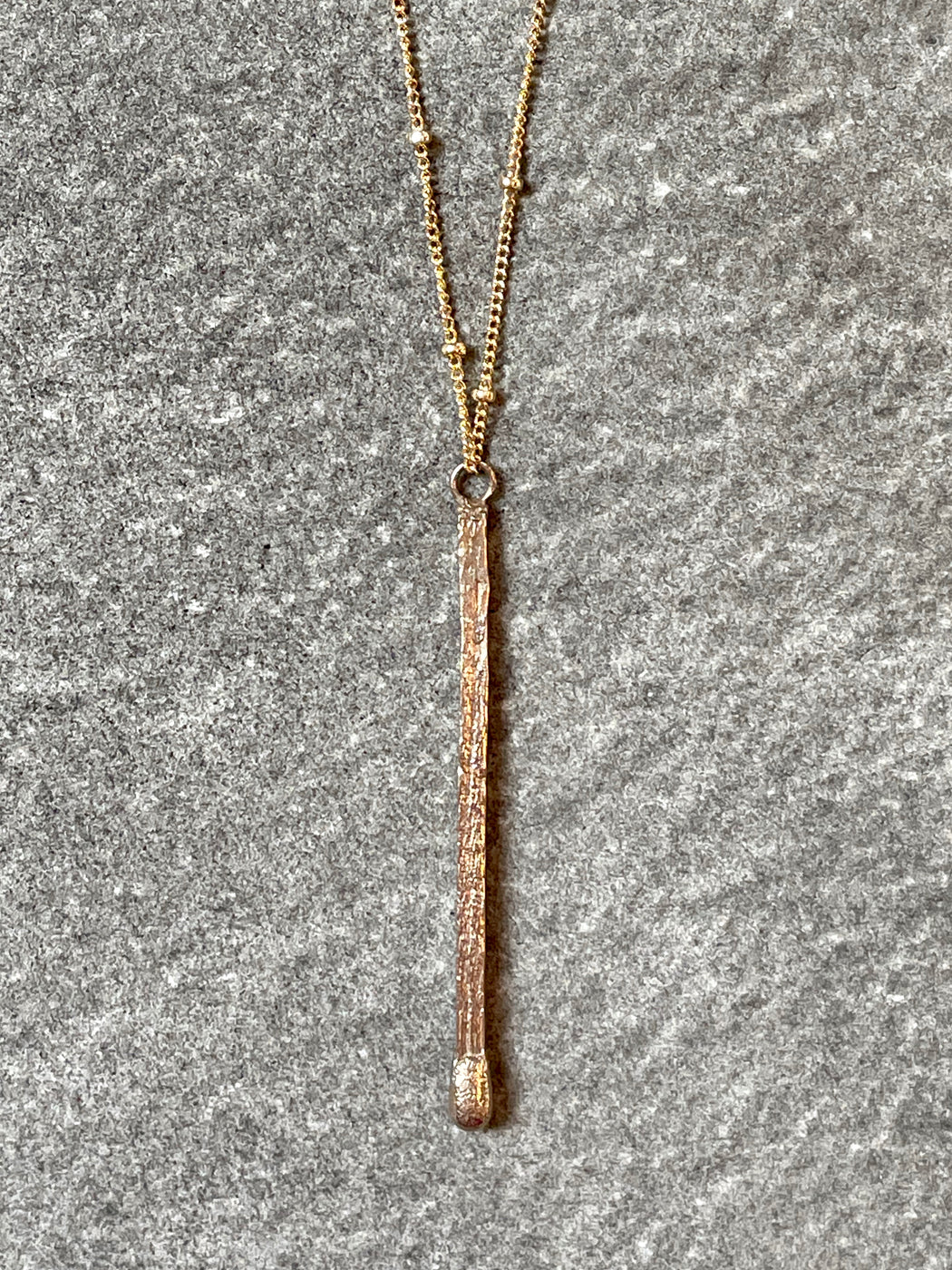 "Ignite" Bronze Pendant by Collarbone