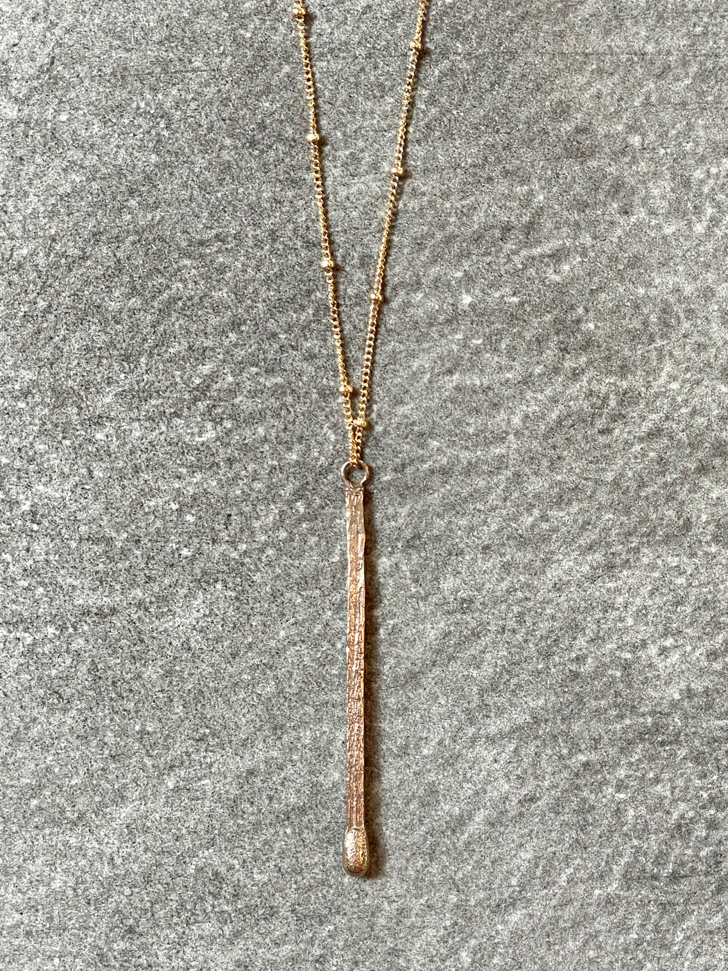 "Ignite" Bronze Pendant by Collarbone